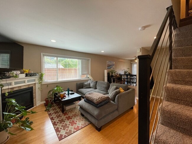 Building Photo - Stylish Corner Condo In Prime Location w/ Parking, Private Outdoor Space & W/D