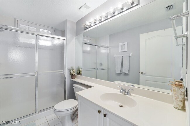 Building Photo - 7687 Pebble Creek Cir Unit 301