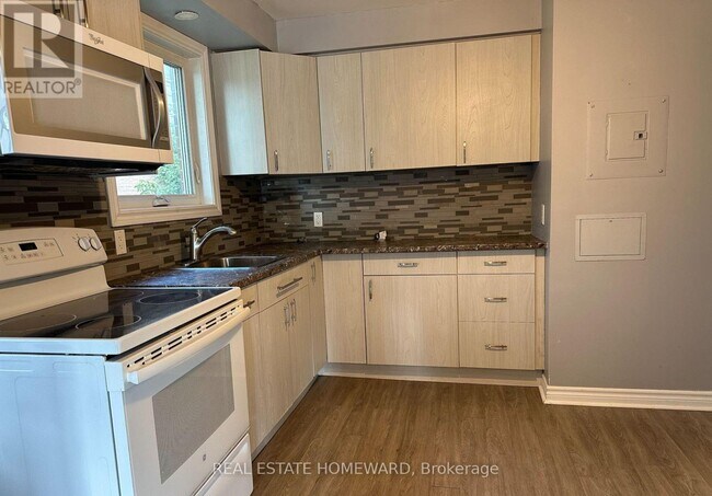 Photo - 511 Harris Ct Unité Main