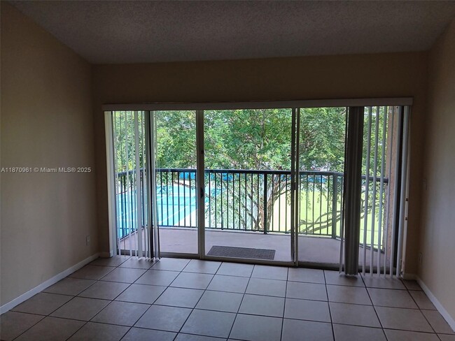 Photo - 8821 Wiles Rd Unit 308