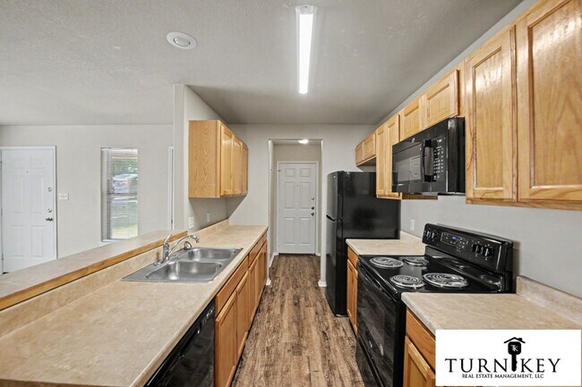 8028-8030 Tanner Ave