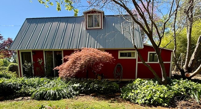 Side of barn with Japanese Maple - 3333 Hamblen Ct Unit Lower  Barn