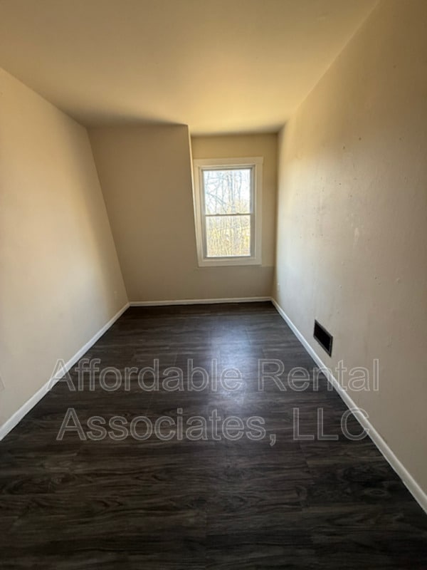 Building Photo - 8951A N 95th St Unit Condo