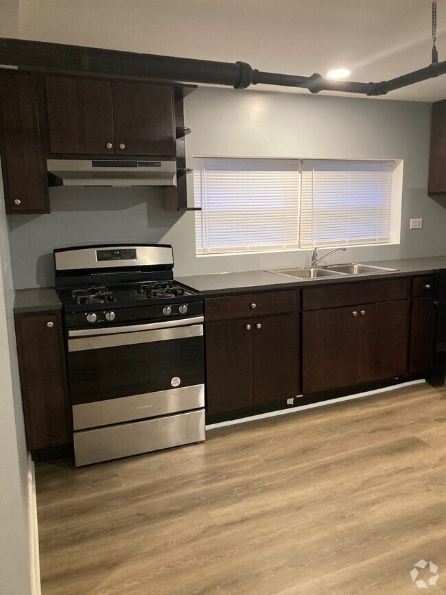 Building Photo - 2743 W 62nd St Unit Garden Rental