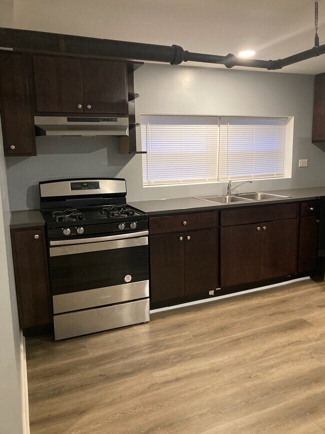 Building Photo - 2743 W 62nd St Unit Garden Rental