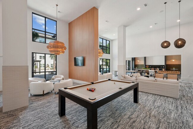 Social Lounge with Billiards & Games - Entertain friends, play games or meet neighbors without leaving home.