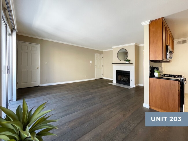 975 sq ft, with BRAND NEW, hardwood floors