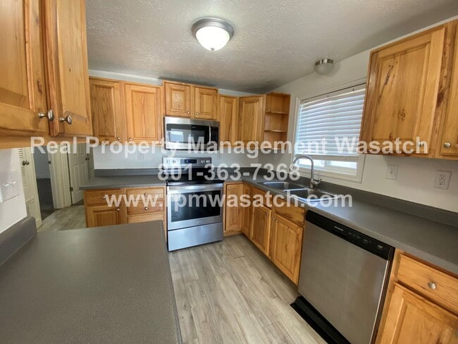 Photo - Take a Look at This 4 Bedroom 2 Bathroom Home in West Jordan UT!!