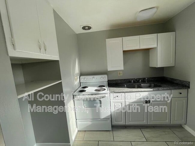 Photo - 9597 E 19th Ave Unidad 6