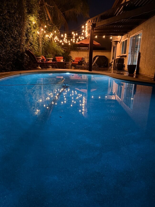 Backyard pebbletech pool - 15481 Cottonwood Cir