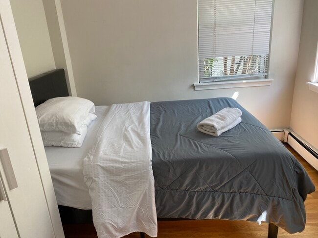 Photo - 1000 Memorial Dr Unit 2 REAR