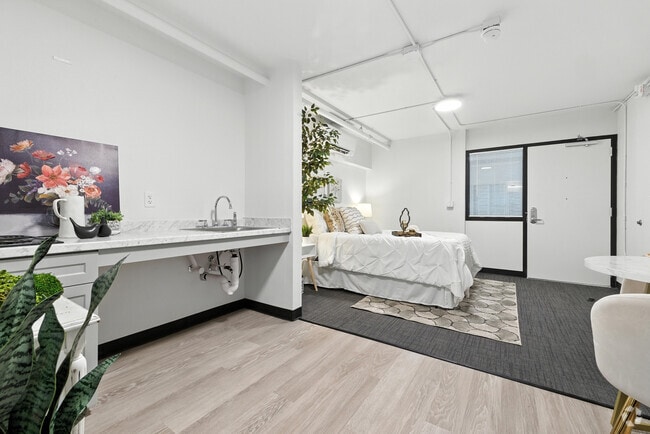 Zona de estar - 1612 Apartments