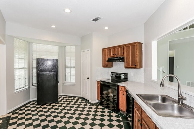 Photo - 4 BR/3BA | Newly Renovated Single Family Home |2-Car Covered Parking | Nice backyard!