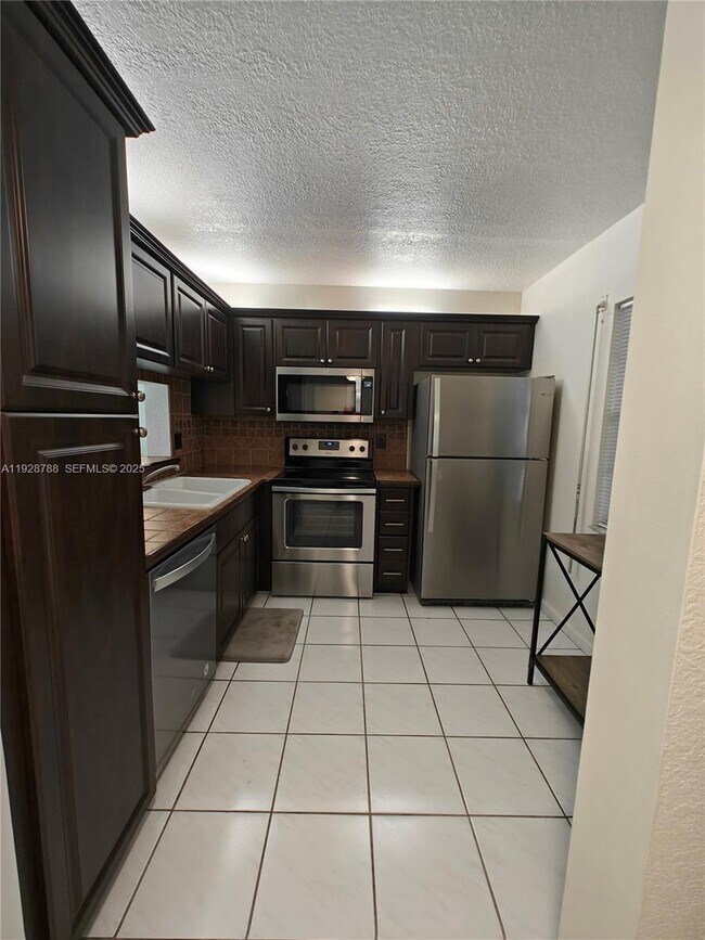 Photo - 8750 Royal Palm Blvd Unit 111-3