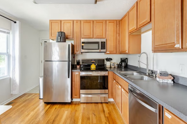 Charming 2-Bedroom Main-Floor Home with Fenced Yard & Garage