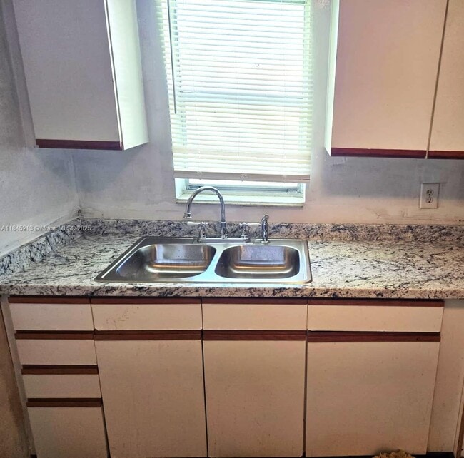Building Photo - 4160 NW 21st St Unit 204G Rental