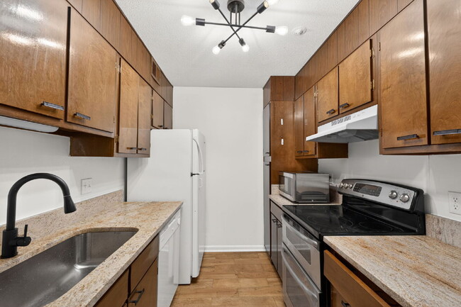 Building Photo - Move-In Ready 2BR Condo | Pool Access & Water Included