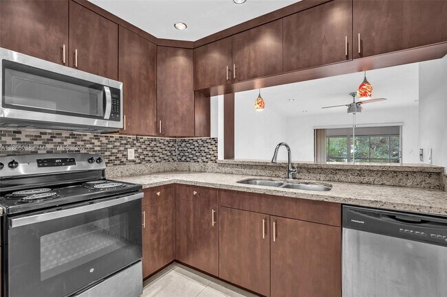 Building Photo - 5790 Stirling Rd Unit 304 Rental
