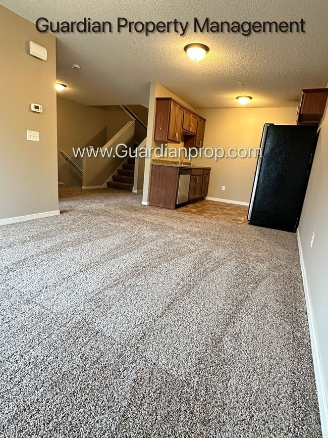 Photo - Champlin Town Home, 2 Car Garage, Dishwasher, Washer/Dryer, Balcony, July/Aug 1st Move In