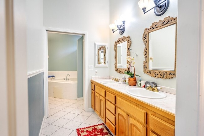 Photo - Large mountain home with 2 car garage and fenced in back yard.