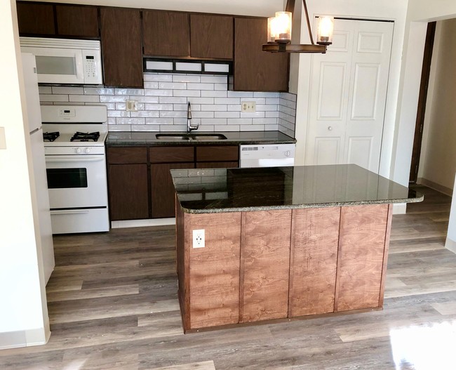 Renovated Kitchen - The Highland Square Apartments