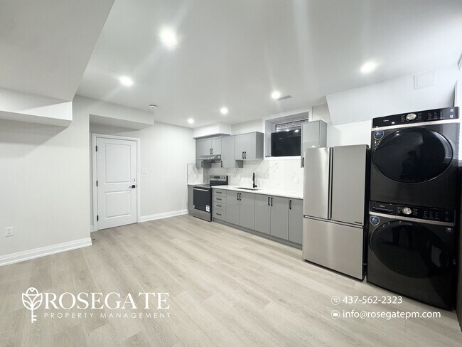 Photo - Bright 2-Bedroom Basement Apartment with P... Unit 2
