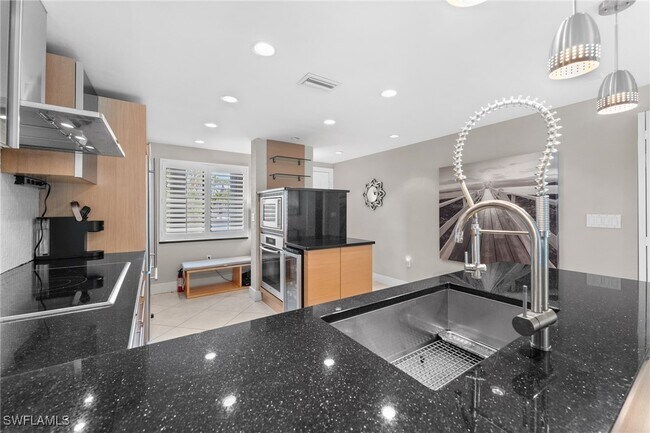 Photo - 3001 Sandpiper Bay Cir Unit B103