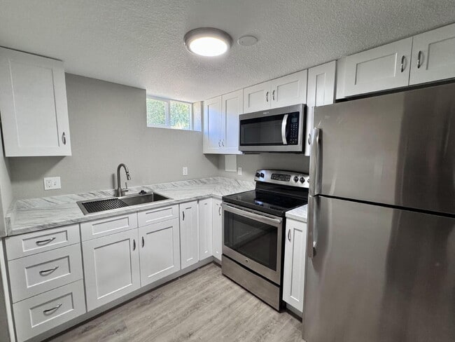 Building Photo - 4886 S Logan St Unit B