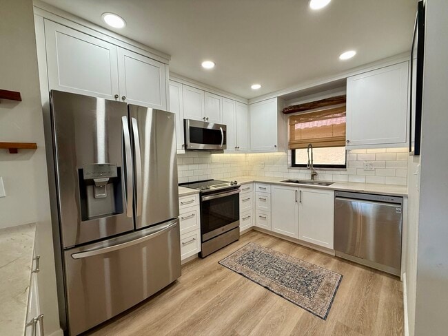 Building Photo - 2081 W Woolbright Rd Unit i201 Rental