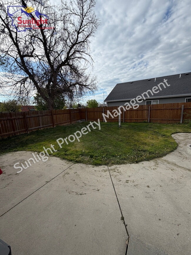 Photo - 2 Bed, 1 Bath Home with Detached Garage, Fenced Yard, and Built-In Storage