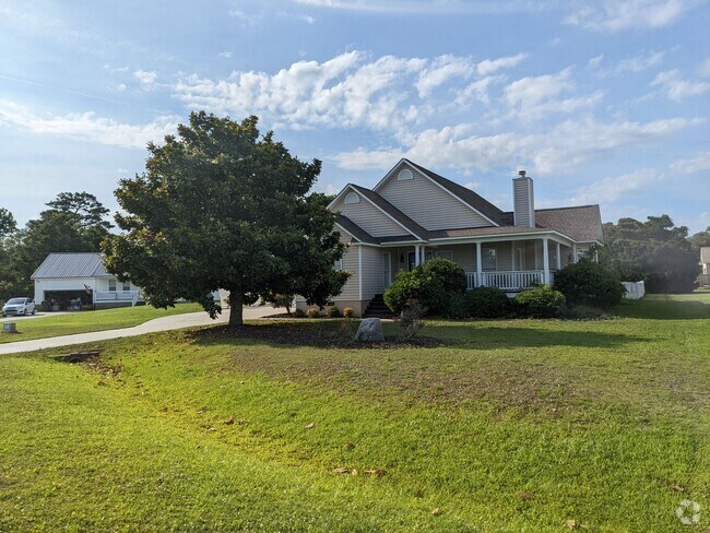 Building Photo - Blue Heron Bay Home Available Now!