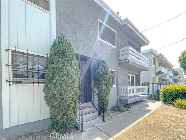 Building Photo - 6655 W 86th Pl Unit 201