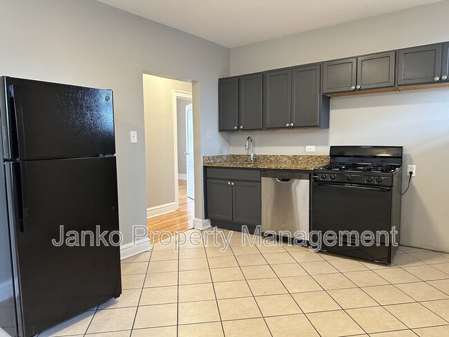 Building Photo - 5605 W Wabansia Ave Unit 3