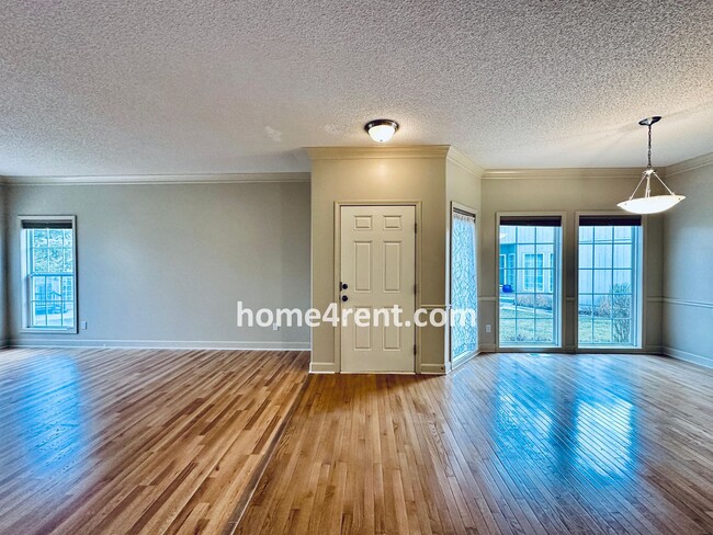 Photo - Maintenance Free! Main level Master, Finished Basement and Wood Floors in the Kitchen! *Brand New...