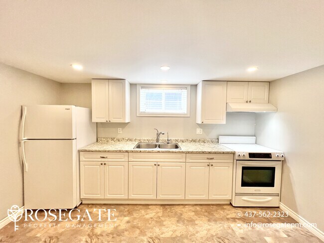 Photo - Spacious 1-Bedroom Basement Apartment in P... Unit 2