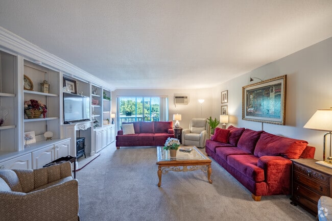 3 habitaciones, 2 habitaciones, 1,550 pies cuadrados, sala de estar - Montcalm Apartments