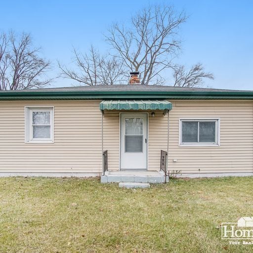 Building Photo - Charming two-bedroom, one-bath home offering a comfortable layout with ample natural light