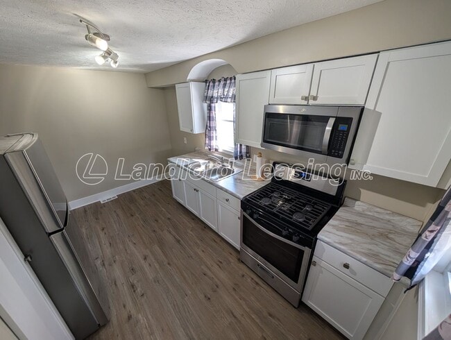 Photo - Updated 3-Bedroom Home with Private Upper Suite & Detached Garage