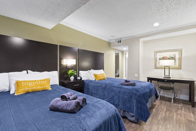 Fusion Orlando - Furnished Bedroom with Two Beds