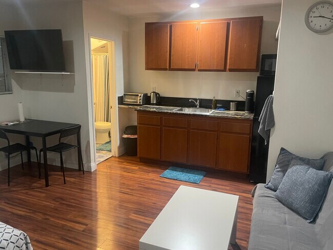 Photo - 12619 Emelita St Unit Garden view