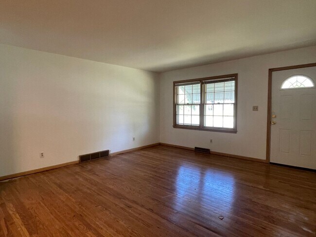 Photo - {731} Convenient Location + Full basement + 2 Car Tandem Garage