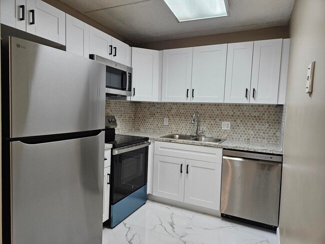 Photo - 300 Village Green Cir S Unit 114