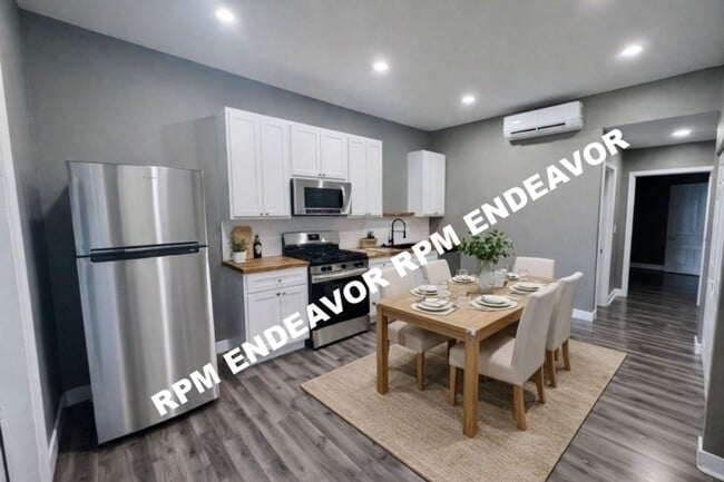 Building Photo - 3230 Pulaski St Unit 3230A Pulaski St 2F