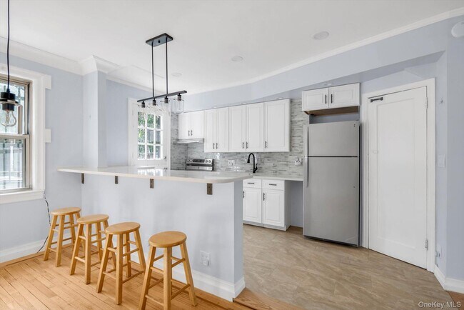 31-39 56th St