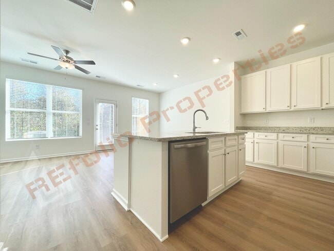 Photo - Move In by April 30 & Save $200/Month! Townhome Only $1,695! Regular $1,950 — Available NOW