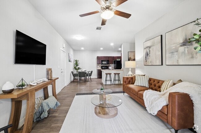 B1 - 2BR, 2BA - 978SF - Living Room - POINTE AT GREENVILLE APARTMENTS