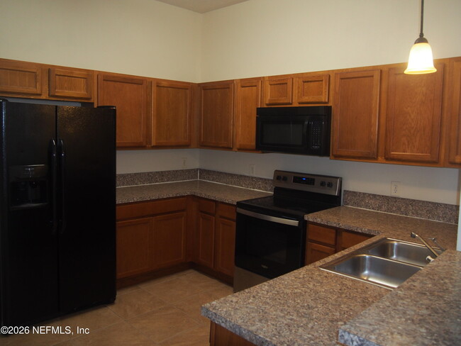 Building Photo - 7920 Merrill Rd Unit 1101