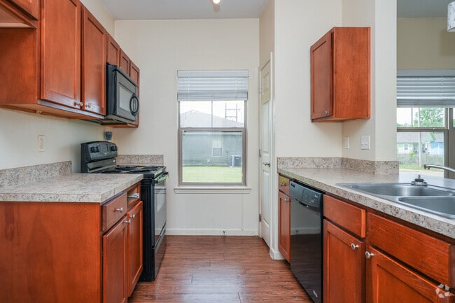 4BR, 2BA - 1,436SF - Kitchen - Austin Village