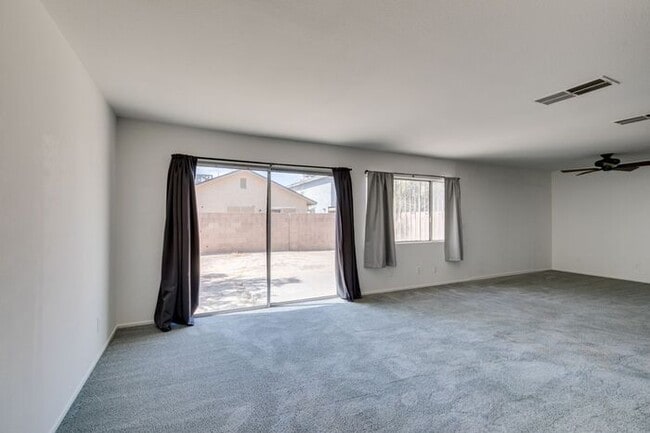 Photo - Double Primary Townhome with Spacious Backyard in 89115!