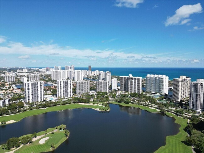 Building Photo - 3675 N Country Club Dr Unit 2606